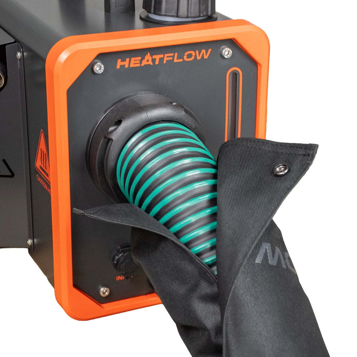 Close-up of a Heatflow outdoor heater with an orange and black front housing, a corrugated green and black intake hose, and a black protective cover partially covering the hose.