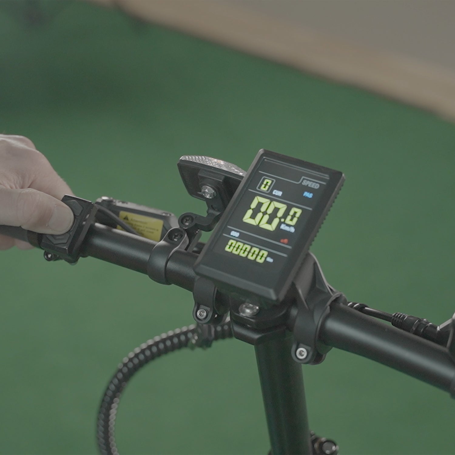 Image of the LCD on the handlebars of the CF250 Folding carbon fibre E-Bike